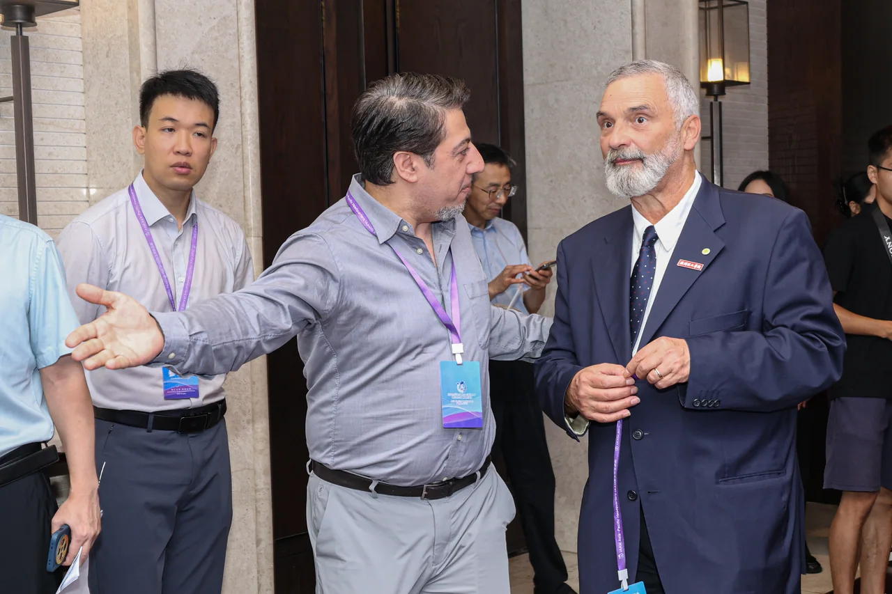 Participants exchanging ideas between conference sessions